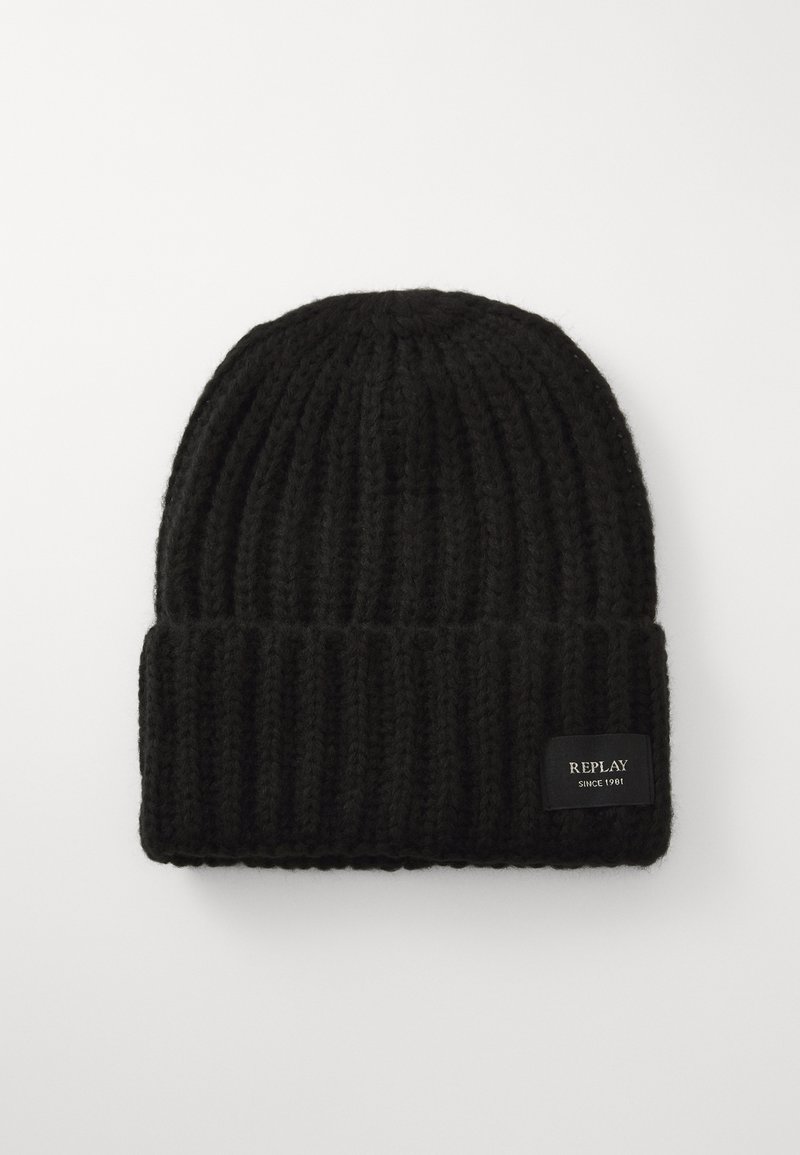 Black knitted beanie with a ribbed texture, featuring a folded cuff and a black label with "REPLAY since 1981" on the side.