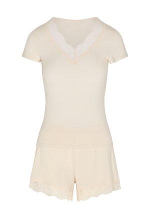 Beiges kurzärmeliges Oberteil und passende Shorts als Pyjama-Set mit Spitzeneinfassung am V-Ausschnitt und Saum der Shorts.