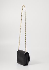 Tommy Hilfiger SOFT CROSSOVER - Cross body bag - black