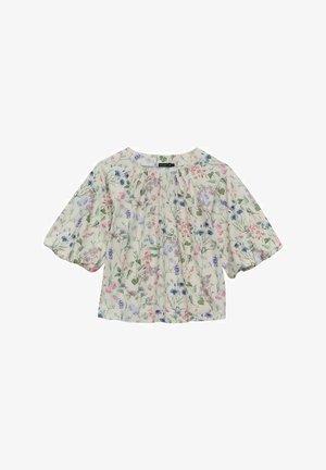 Kukkakuvioinen paita, jossa on vaalea kerma tausta, lyhyet puffihihat ja kerätty kaula-aukko, koristeltuna värikkäillä kasvikuvastoilla.