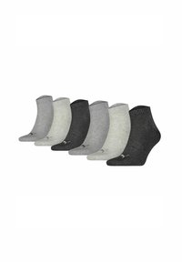 Ankle socks set in three shades: light gray, medium gray, and dark gray. Ribbed cuffs with a subtle logo on each sock. Soft material texture.