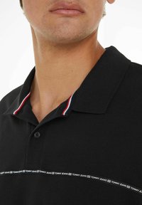 Tommy Jeans Polo - schwarz