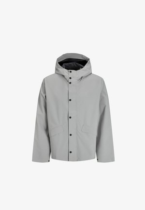 Hele hall šedaa veekindel jakk kapuutsiga, nupuga sulgemine ja kaks esikotti. Omab sileda tekstuuri ja minimalistlikku disaini.