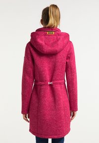Magenta hooded coat with a textured fabric, drawstring waist, and side pockets. Features a soft, warm design, suited for cool weather.
