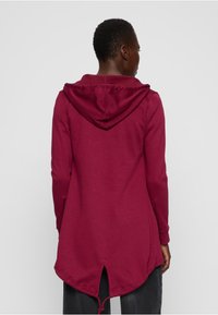 Urban Classics Športna jopa s kapuco na zadrgo - red