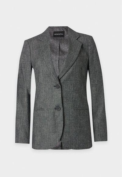 Blazer gris à carreaux avec deux boutons devant, revers à crans et manches longues, posé à plat sur un fond gris clair.