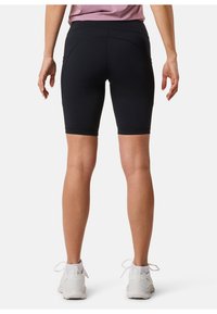 Sorte atletiske shorts med en længde til midten af låret, lavet af strækbart stof, med en glat tekstur og et bredt, højt bærestykke.