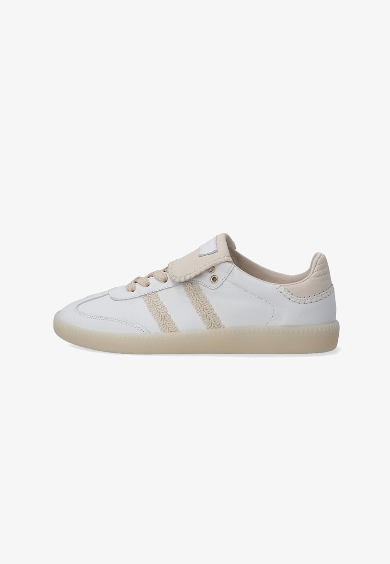 White leather sneakers with beige accents, featuring textured stripes, lace-up closure, and a rounded rubber sole.