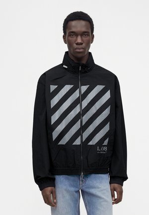 L/AB c/o Off-White, REFLECTIVE DIAG WINDBREAKER JACKET - Леко яке - black