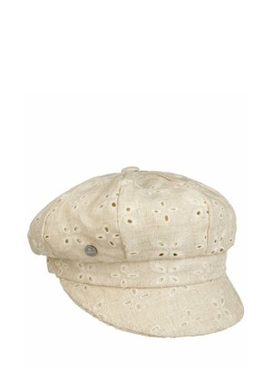 Beige linen fabric cap with embroidered eyelet floral patterns and a small metal brand tag on the side, featuring a soft, rounded crown and short brim.