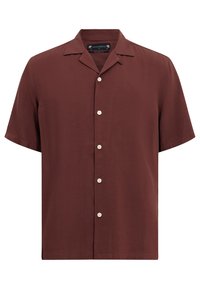 Chemise à manches courtes boutonnée de couleur marron foncé avec un col camp et des boutons blancs sur le devant.