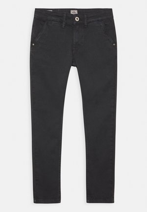 Svarta denimbyxor med smal passform, med knappstängning, fem fickor och subtila sömdetaljer på sidorna. Slät textur.