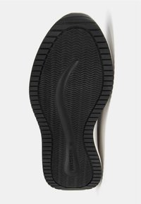 Sort gummisål til sko med strukturerede riller, et buet bue-design og en synlig mærkeetiket nær hælen. Glat overflade med mat finish.