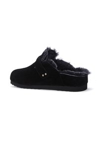 Black suede clogs with fur lining, featuring a curved shape, a strap with metal accents, and a textured rubber sole.
