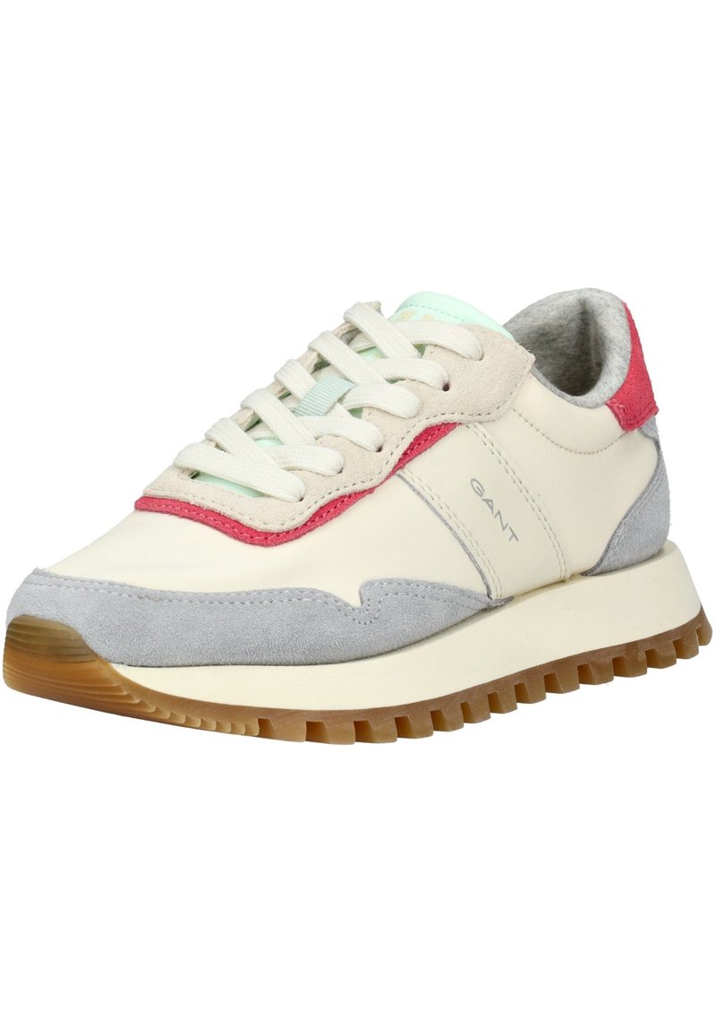 Sneakers med en beige lærsoverdel, grå semsket skinnakenter og røde detaljer. Har en teksturert gummisåle og flate lisser.