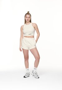 Pegador AYLA CROP - Felső - washed coconut milk/black