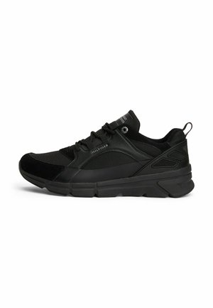 Black low-top sneaker with mixed materials, lace-up design, branded "Hilfiger" on side and tongue, and textured rubber sole.