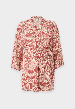 Red and cream patterned kimono with three-quarter sleeves, tie belt at the waist, and floral motifs throughout the fabric.