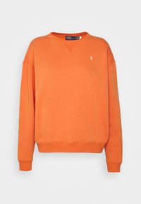 Felpa arancione in cotone con scollo a V, orlo e polsini a costine. Presenta un piccolo logo ricamato sul lato sinistro del petto.