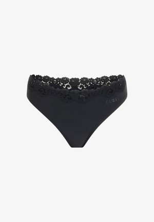 Schwarzer String mit einem Blumen-Spitzenbund, der einen glatten Stoffkörper und gewellte Kanten aufweist. "GUESS"-Logo auf der Seite geprägt.