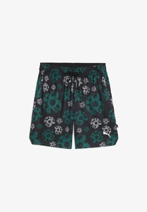 Black mesh swim shorts with green and white floral pattern, elastic waistband, and drawstring. Features a white logo on the lower side.