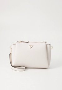 Helebeežikas tekstuurse sünteetilise materjaliga ristkott. Omadusteks on lukuga kinnis, kuldsed detailid ja eemaldatav rihm.