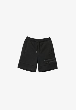 Schwarze Freizeithose mit elastischem Bund, Kordelzug, zwei Vordertaschen und zwei horizontalen Reißverschlusstaschen am rechten Bein.