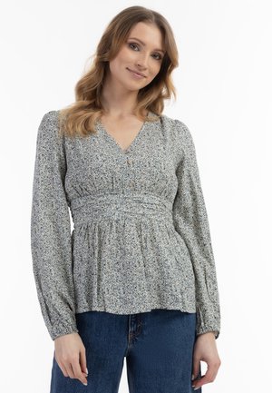 Bluse mit floralem Muster, V-Ausschnitt, geraffter Taille und langen Puffärmeln. Hergestellt aus weichem Stoff in hellen Tönen von Blau, Gelb und Grün.