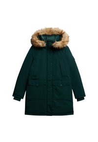 Parka de color verde oscuro con capucha con pelo, que cuenta con dos bolsillos en el pecho y dos bolsillos inferiores con solapa, fabricada con un tejido duradero y aislante.