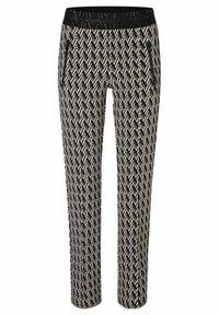 Pantalon à motifs noirs et blancs avec un design en chevrons, taille élastique et poches latérales zippées. Coupe slim avec une jambe fuselée.