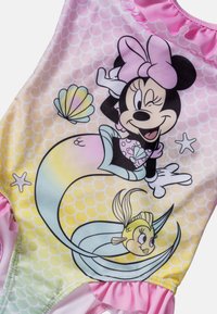 Ett enbitarssimset med en rosa volangkrage, flerfärgad snäcka och havsfruedesign, med Minnie Mouse och en tecknad fisk som accent.