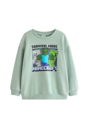 Jasnozielona bluza z postaciami z Minecrafta i napisami "Survival Mode Minecraft" na przodzie.