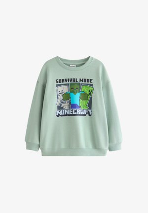 Jasnozielona bluza z postaciami z Minecrafta i napisami "Survival Mode Minecraft" na przodzie.