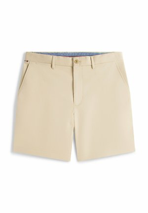 Beige knielange Shorts mit Gürtelschlaufen, vorne mit Knopf und Reißverschluss sowie schrägen Taschen auf beiden Seiten.