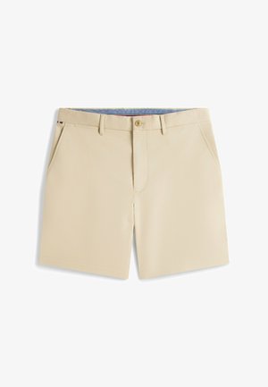 Beige knielange Shorts mit Gürtelschlaufen, vorne mit Knopf und Reißverschluss sowie schrägen Taschen auf beiden Seiten.