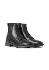 Stivali alla caviglia in pelle nera con lacci sul davanti, pannelli laterali elastici, dettagli brogue e tacco basso a blocco. Texture liscia, design classico.