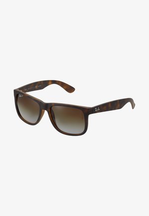 Ochelari de soare cu model țestoasă, cu lentile întunecate în degrade. Cadru din plastic cu formă pătrată largă, având logo-ul Ray-Ban pe lateral.