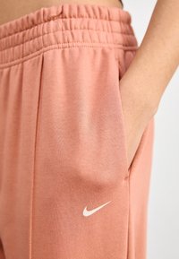 Nike Sportswear Träningsbyxor - beige