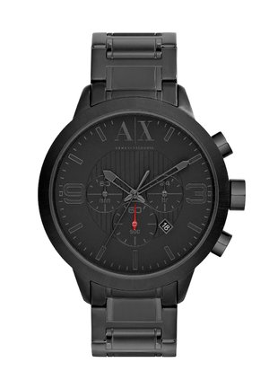 Montre chronographe noire avec un boîtier rond, un cadran texturé noir, des index argentés et une aiguille des secondes rouge. Dotée d'un bracelet en métal maillé.