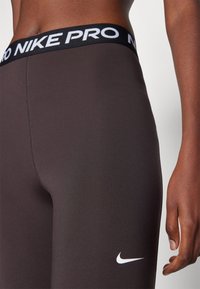 Nike Performance 365 - Leggings - velvet brown