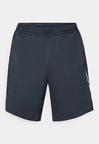 Men's athletic shorts in dark navy, featuring an elastic waistband, side slits, and white logo text on the left leg. Lightweight, smooth fabric.