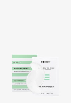 Emballage des masques pour les yeux BIOEFFECT Imprinting ; boîte à rayures vertes et blanches avec du texte. Comprend un masque pour les yeux en hydrogel clair, conçu pour l'application.