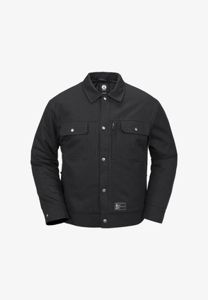 Veste en coton noir au design structuré, comportant deux poches poitrine, une poche zippée et des boutons-pression. Tissu texturé avec une étiquette.