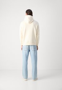GANT FRONT GRAPHIC  - Mikina s kapucňou - cream
