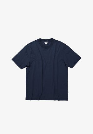Donkerblauwe katoenen t-shirt met een ronde hals, korte mouwen en een effen ontwerp. Inclusief een klein merklabel aan de zoom.