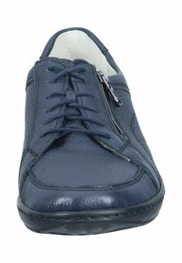 Navy leather shoe features a round toe, front lacing, and a side zip closure. The textured surface adds depth to the design.