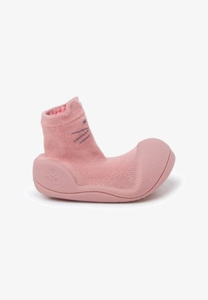 Pink children's shoe with a soft fabric upper, rounded toe, and rubber sole. Designed with whisker patterns on the front and a padded ankle.