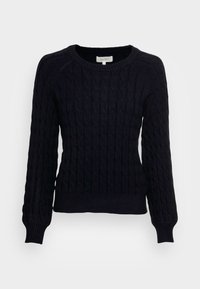 Maglione nero in maglia lavorata a trecce con maniche lunghe, scollo rotondo, orlo e polsini a coste, caratterizzato da un motivo testurizzato su tutta la superficie.
