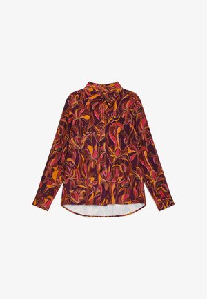 Long-sleeve button-up shirt with vibrant red, orange, and pink floral pattern on a dark purple background, featuring a pointed collar.