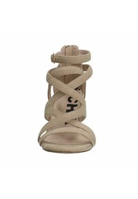 Beige suède hoge hak sandaal met een crisscross bandontwerp, enkelgesp en open teen. Gladde textuur en minimalistische vorm.